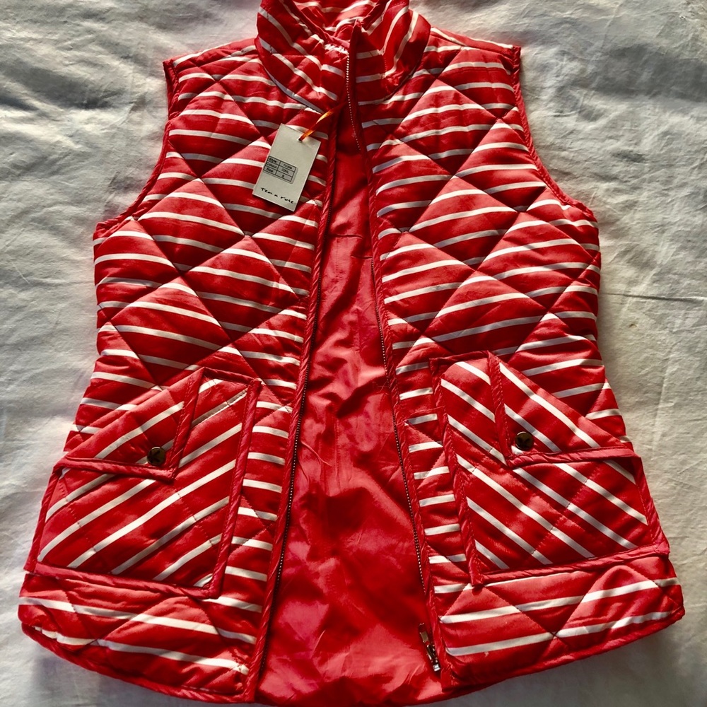 Coral colored zip puffer vest.  New with tags